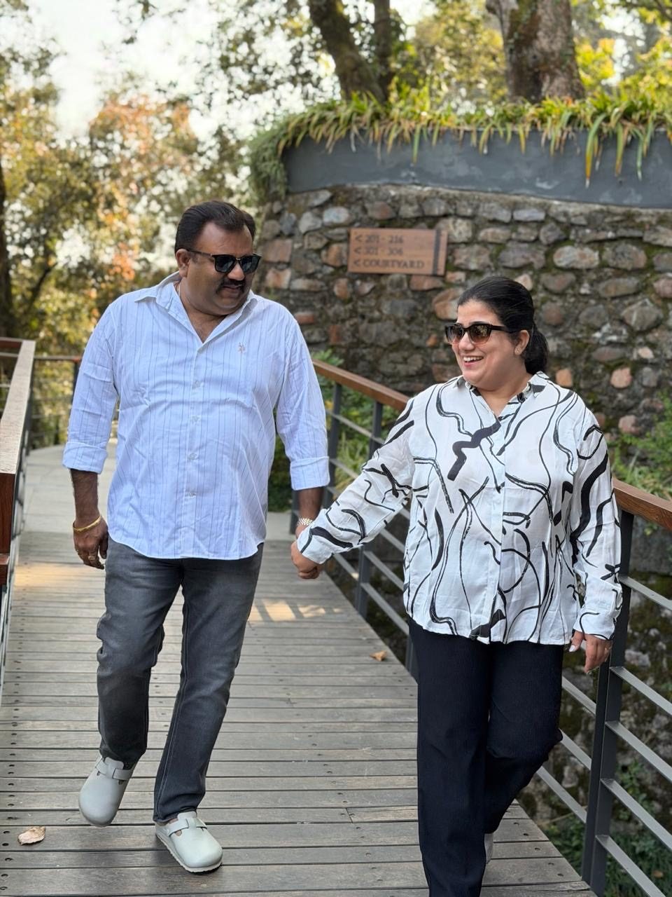 Rajkumar and Rupali walking hand in hand